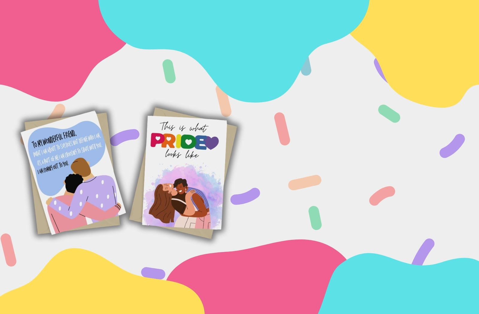 A multicoloured banner, with LGBTQ+ pride card and a Coming Out card next to one another.  